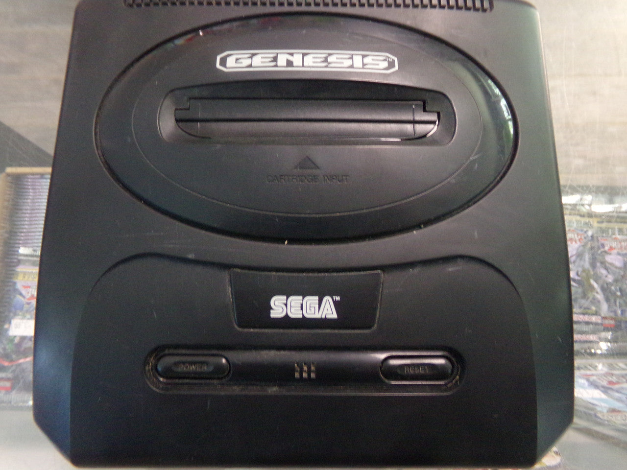 Used Sega Genesis Model 2, Sega CD console selling with 22 games, 2 controllers.