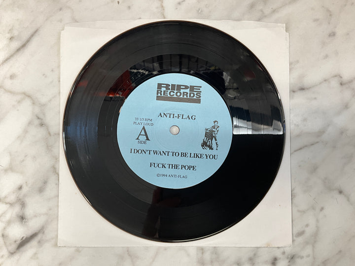Anti-Flag / The Bad Genes - Rock’n With Father Mike (1994 Yellow Sleeve) Very Good VR101726