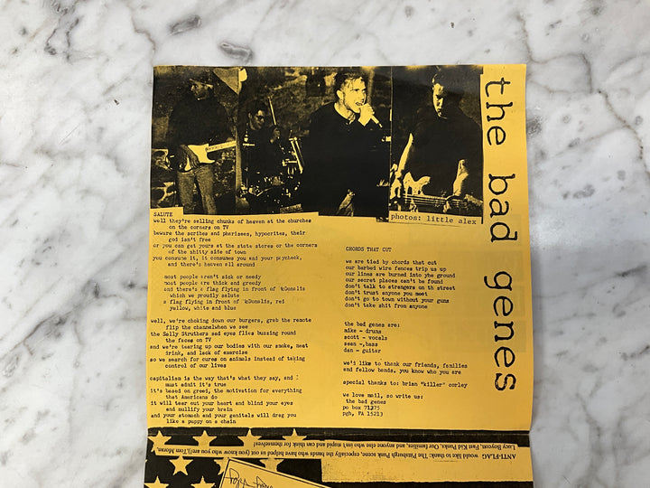 Anti-Flag / The Bad Genes - Rock’n With Father Mike (1994 Yellow Sleeve) Very Good VR101726