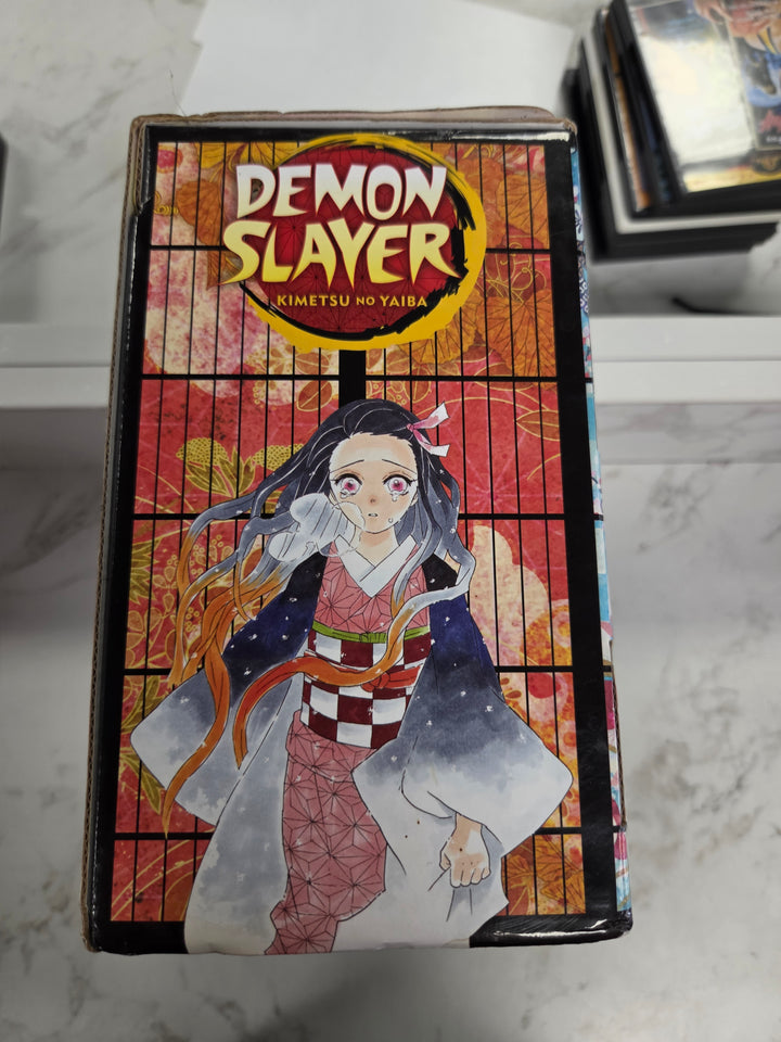 Demon Slayer Complete Box Set (Contains Volumes 1-23 English with Double Sided Poster & Mini-Book) UG82826