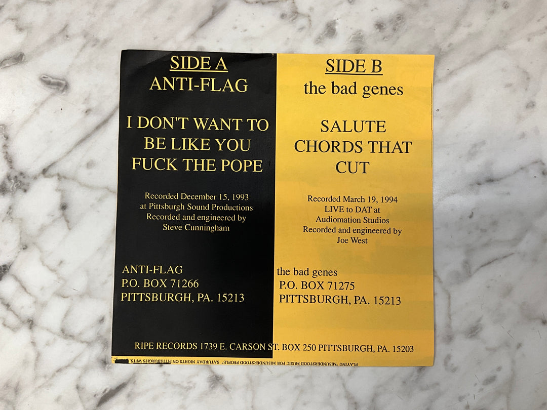 Anti-Flag / The Bad Genes - Rock’n With Father Mike (1994 Yellow Sleeve) Very Good VR101726