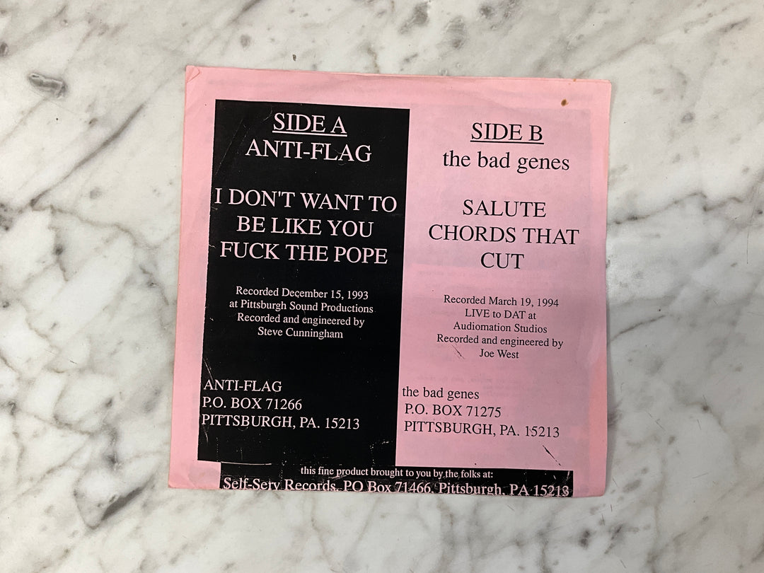 Anti-Flag / The Bad Genes - Rock’n With Father Mike (1994 Pink Sleeve) Very Good VR101726
