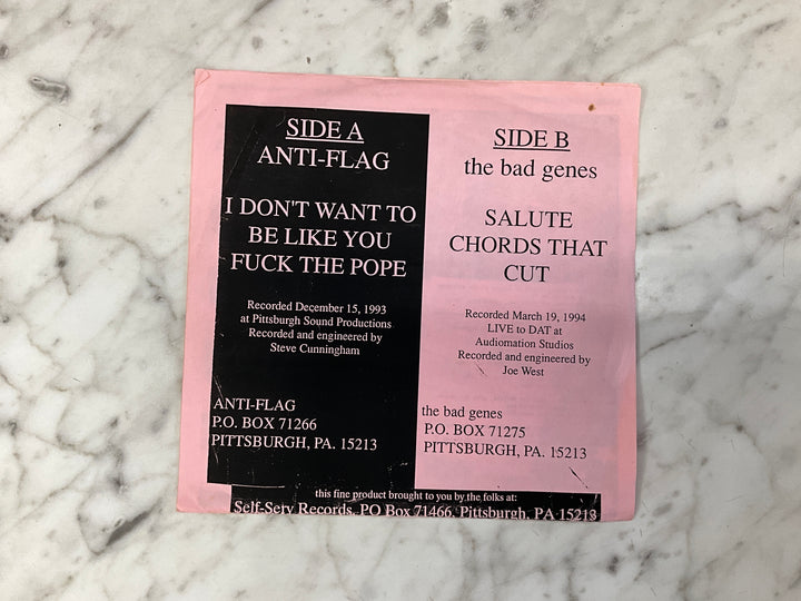 Anti-Flag / The Bad Genes - Rock’n With Father Mike (1994 Pink Sleeve) Very Good VR101726