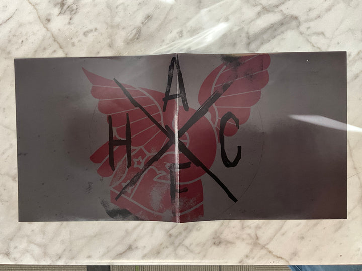 Anti-Flag + Hostage Calm - Branded Rebellion + Olly Olly Oxen Free (Single Sided, Etched, Red & White w/ Blue Splatter) Very Good VR102626