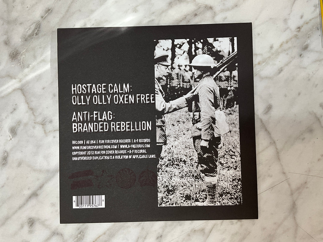 Anti-Flag + Hostage Calm - Branded Rebellion + Olly Olly Oxen Free (Single Sided, Etched, Red & White w/ Blue Splatter) Very Good VR102626