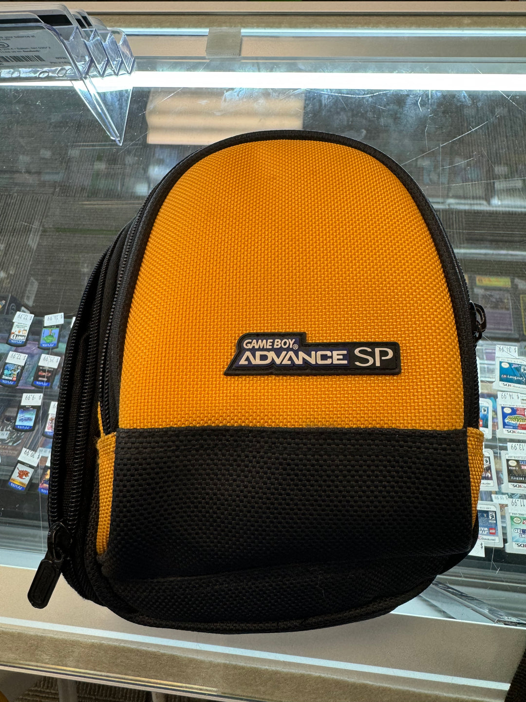Gameboy Advance SP, Backpack Style Storage Case, Pre - Owned, Yellow / Orange m24