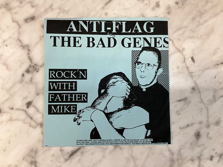 Anti-Flag / The Bad Genes - Rock’n With Father Mike (1994 Blue Sleeve) Very Good VR101726