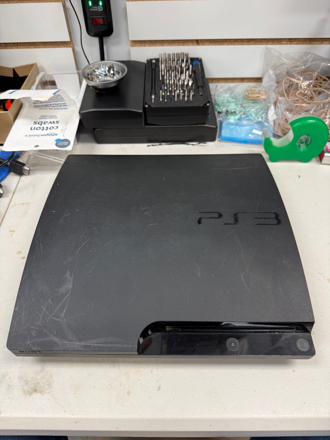 FOR PARTS NOT WORKING - Hitching Disc Drive PS3 Slim - POX016
