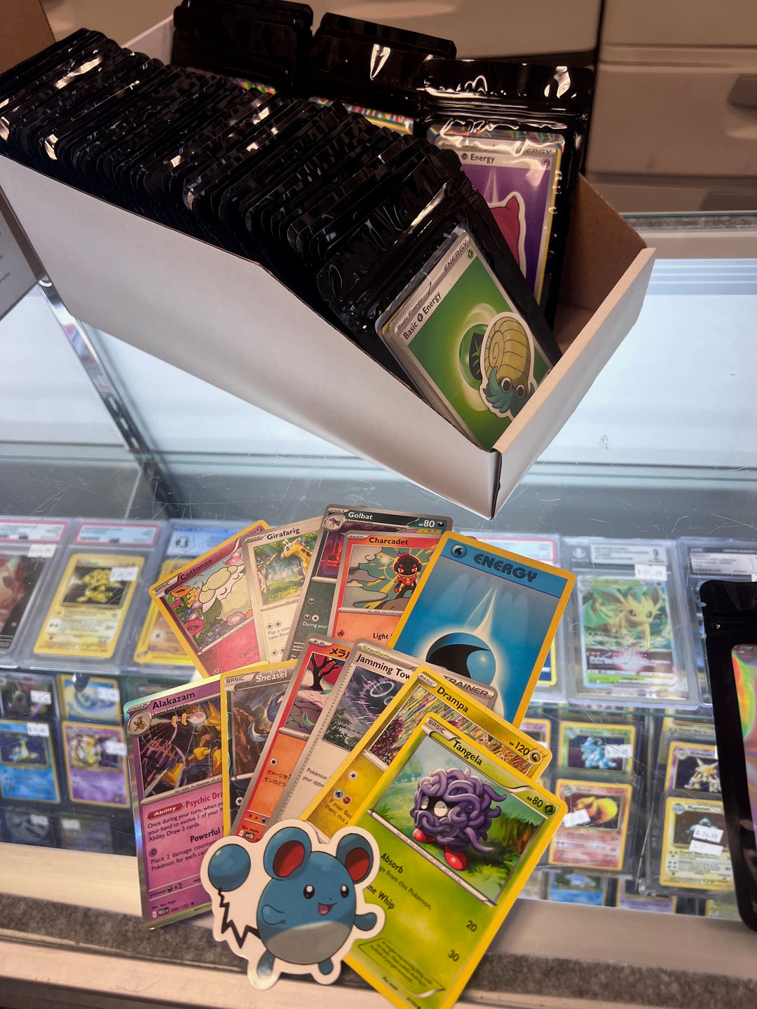 Core Gaming PokePack - 1 sticker, 1 energy and 10 random bulk cards (at least two holos)