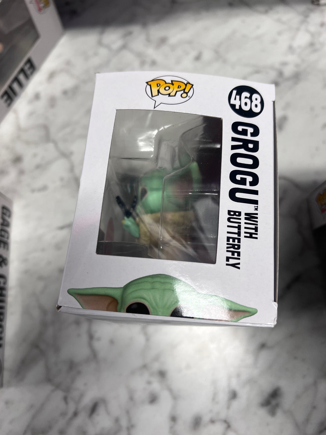 Funko Pop! Grogu with Butterfly #468 Star Wars Squished Corner FP121025