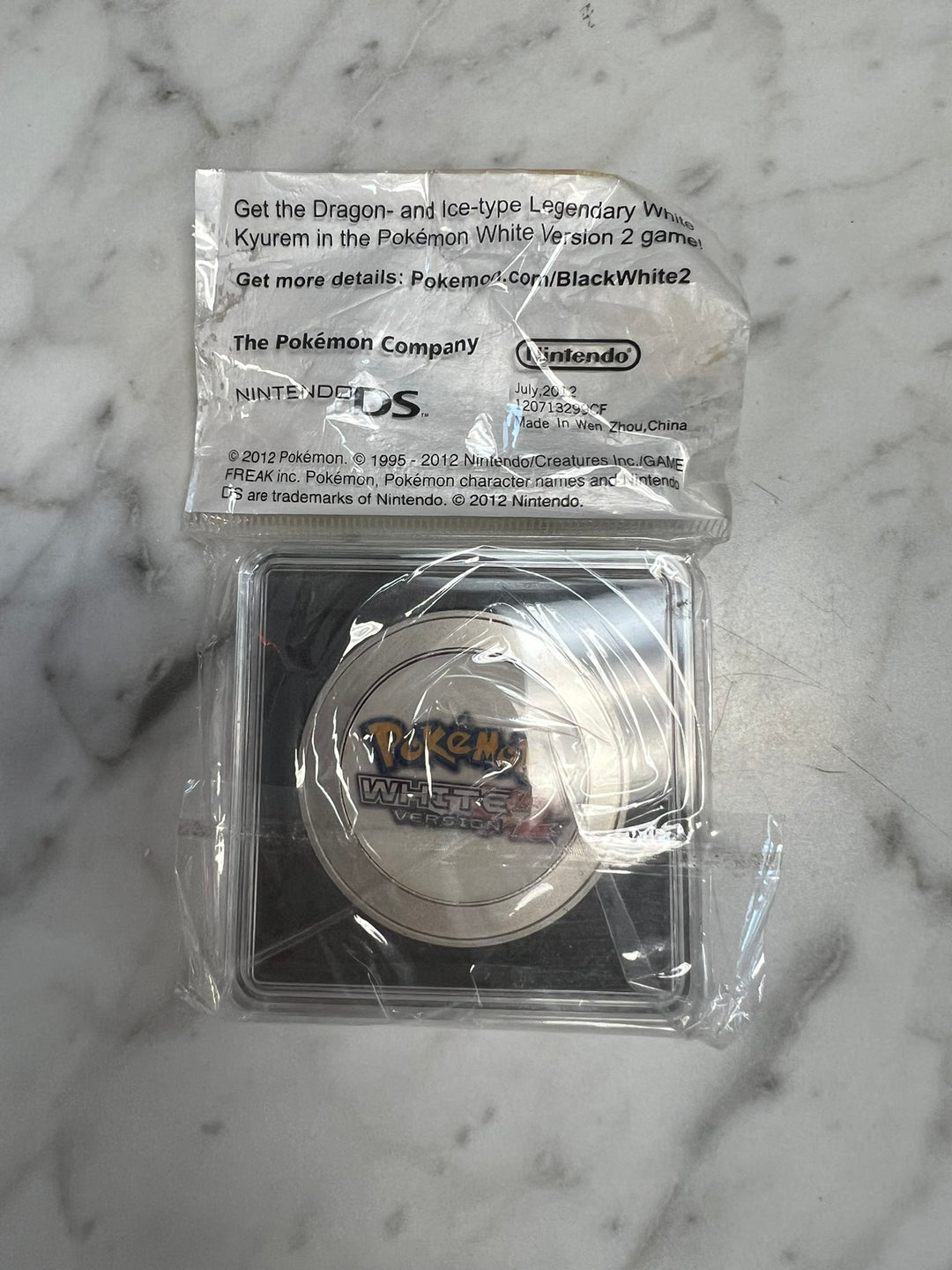 New Sealed White Kyurem Commemorative Coin from Pokemon White Version 2 NA62226