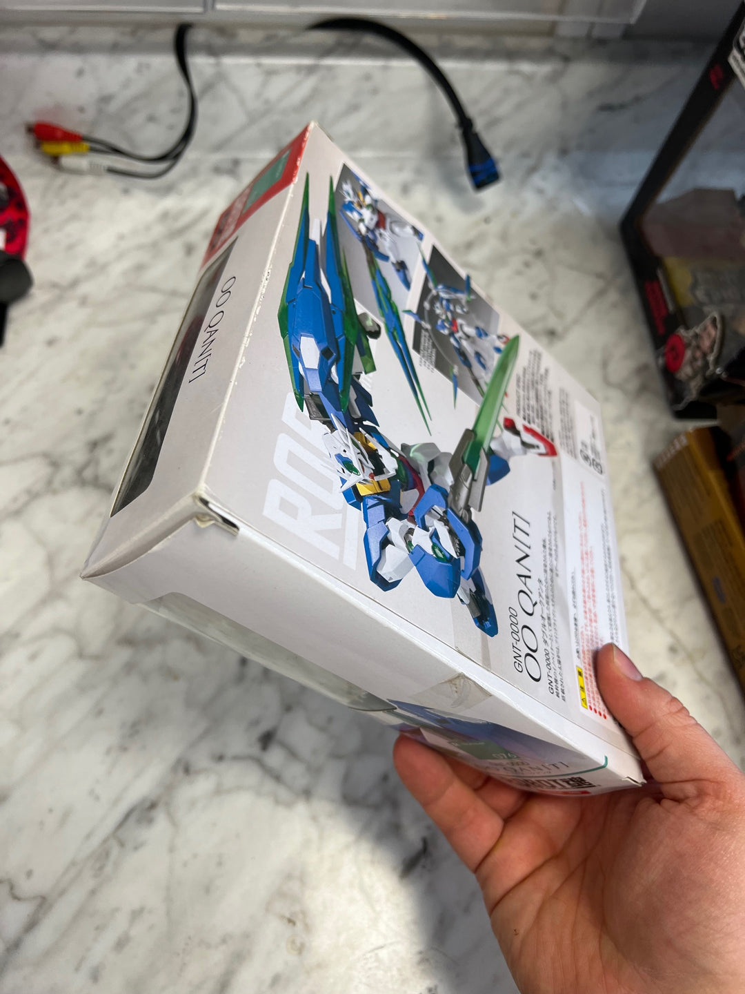 Bandai Hobby Gundam 00 GNT-0000 00 Qan[T] Quanta HG 1/144 Model Kit U4425