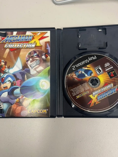 Mega Man X Collection for Playstation 2 PS2 in case. Tested and Working.     DO63024