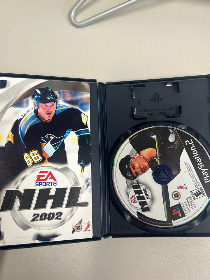 NHL 2002 for Playstation 2 PS2 in case. Tested and Working.     DO63024