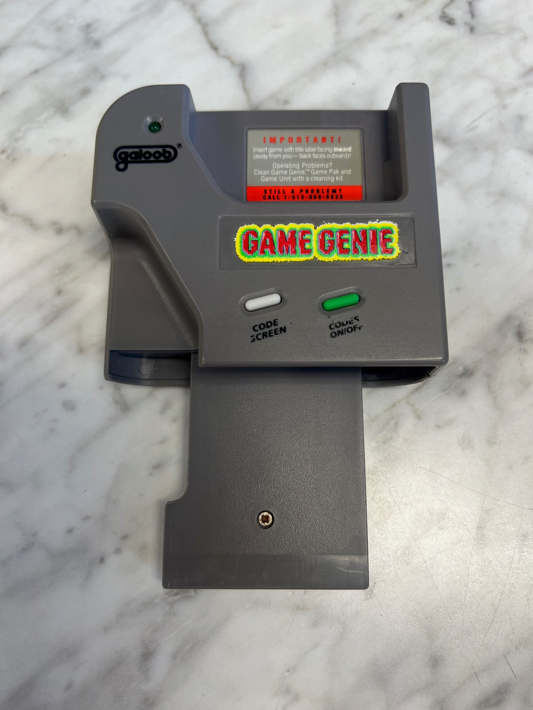 Game Genie for Gameboy with Code Book. Tested and working A63025