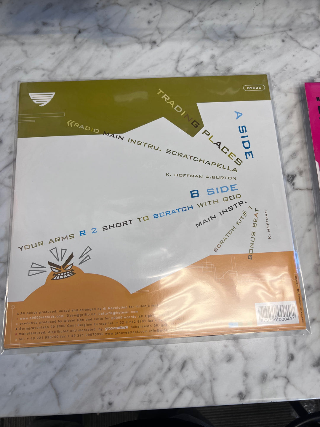 DJ: Revolution ft Baby Blak Trading Places, Your Arms... (VG+) Condition Vinyl Record VR10125