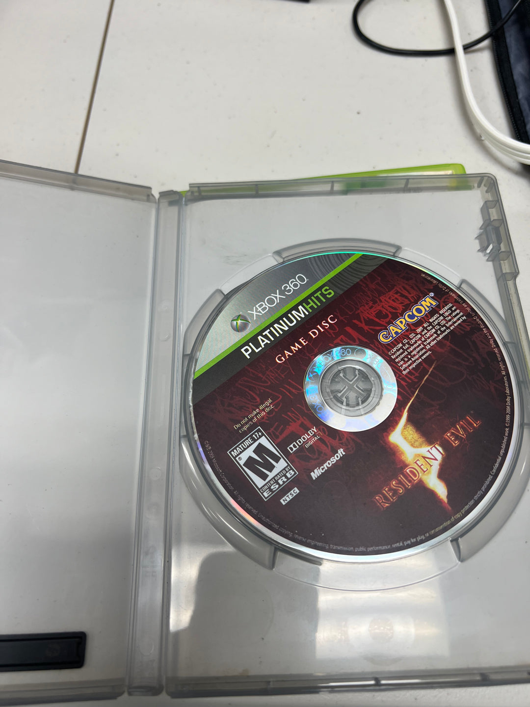 Resident Evil 5 for Microsoft Xbox 360 in case. Tested and working.     DO61024