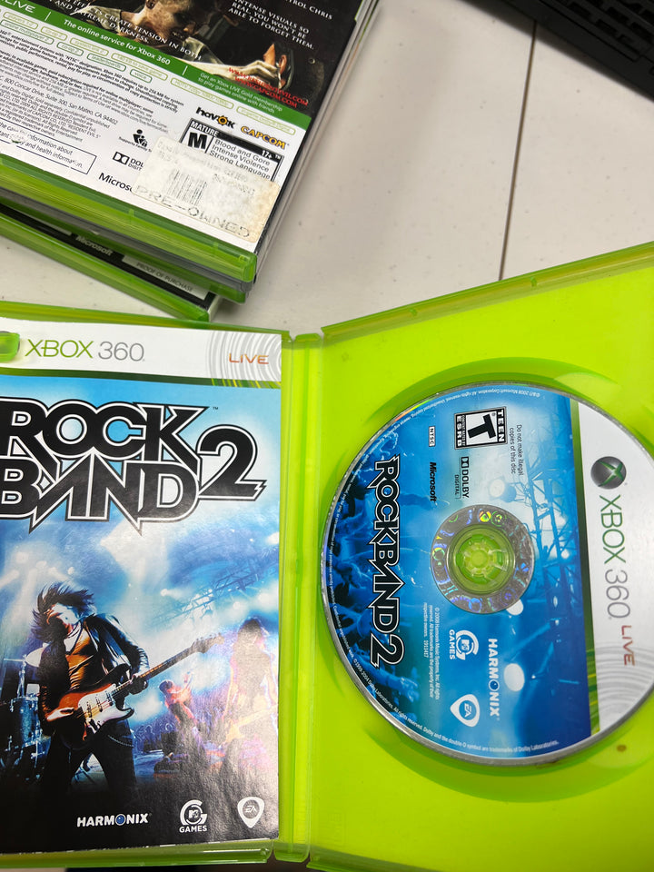 Rock Band 2 for Microsoft Xbox 360 in case. Tested and working.     DO61024
