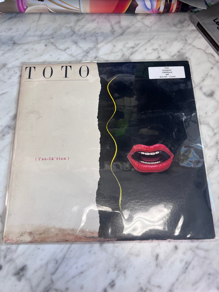 Toto - Isolation  (VG+) Condition Vinyl Record BOS10225