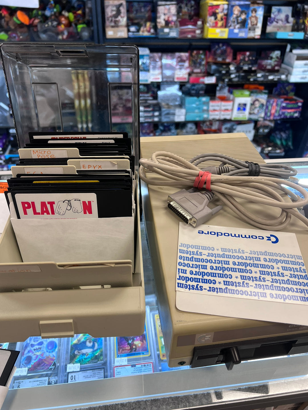 Commodore 64 5 1/4" Floppy Disk Drive w/ cables and about 75 Games (Untested) UA12926