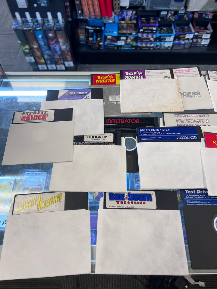 Commodore 64 5 1/4" Floppy Disk Drive w/ cables and about 75 Games (Untested) UA12926