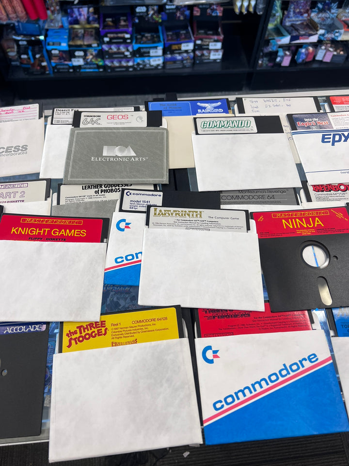 Commodore 64 5 1/4" Floppy Disk Drive w/ cables and about 75 Games (Untested) UA12926