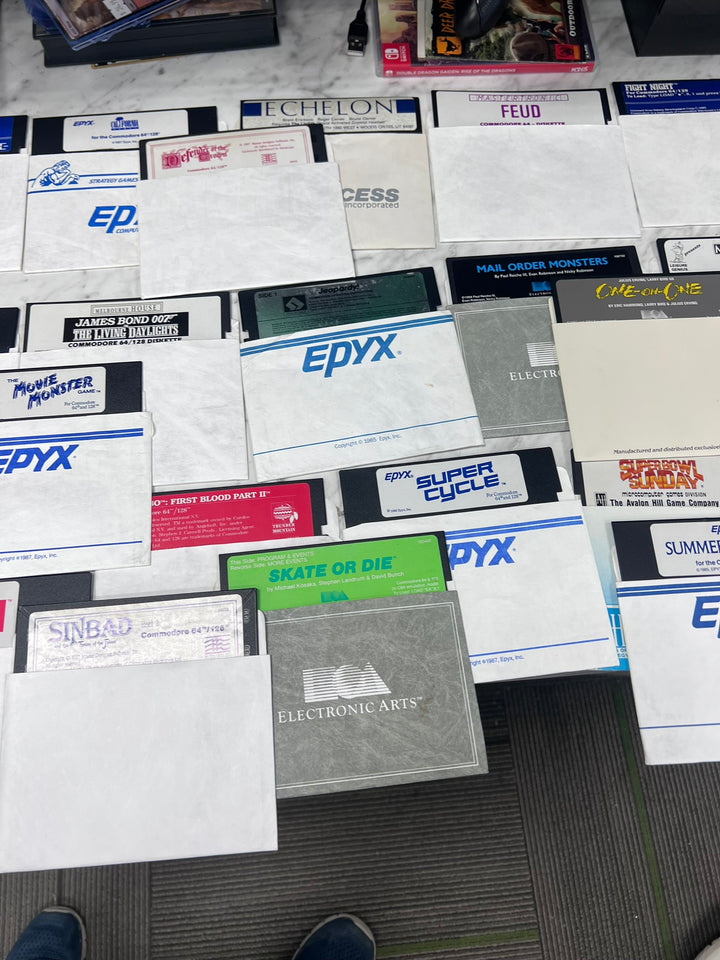 Commodore 64 5 1/4" Floppy Disk Drive w/ cables and about 75 Games (Untested) UA12926