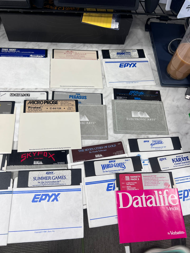 Commodore 64 5 1/4" Floppy Disk Drive w/ cables and about 75 Games (Untested) UA12926