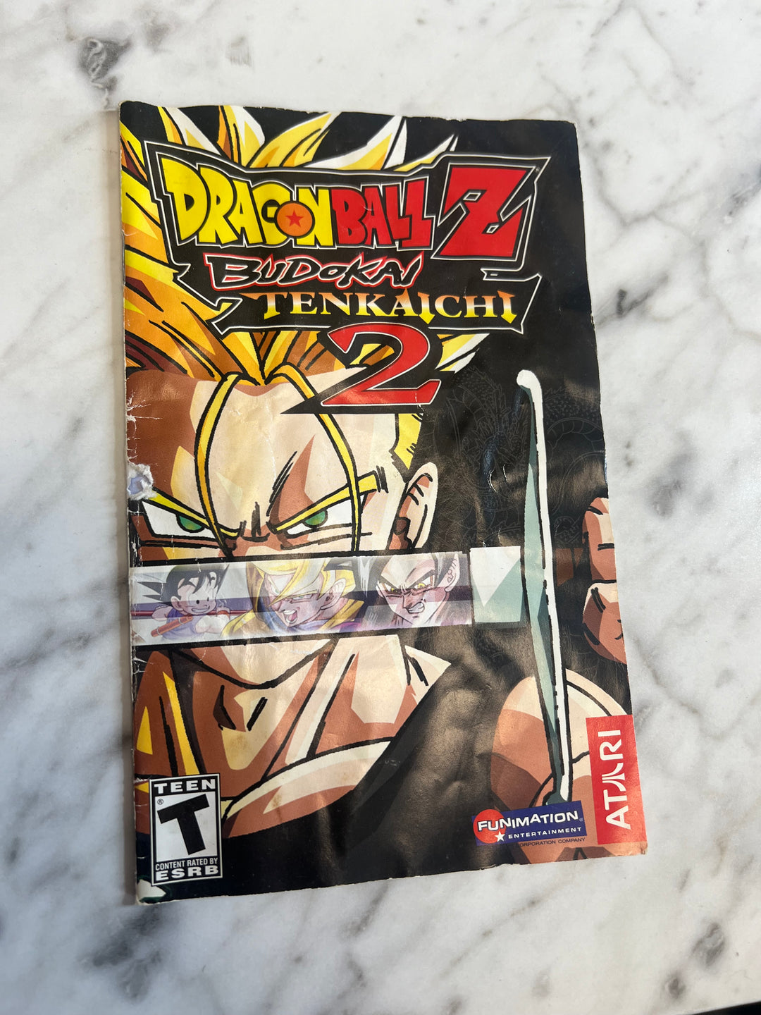 Dragonball Z Budokai Tenkaichi 2 PS2 Playstation 2 MANUAL ONLY  Water Damaged MO92324