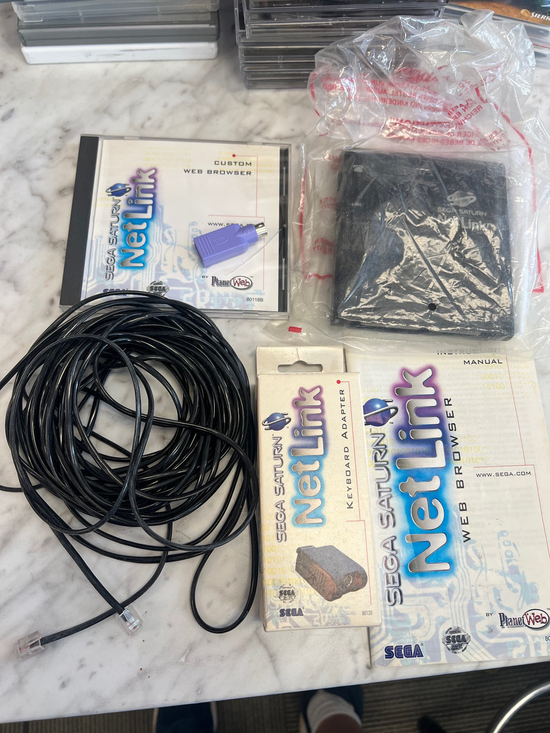 Sega Saturn Netlink Bundle Keyboard Adapter, Browser Disc, Modem UA42125