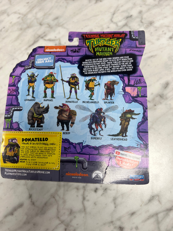 Teenage Mutant Ninja Turtles Mutant Mayhem "DONATELLO" Action Figure New squished box