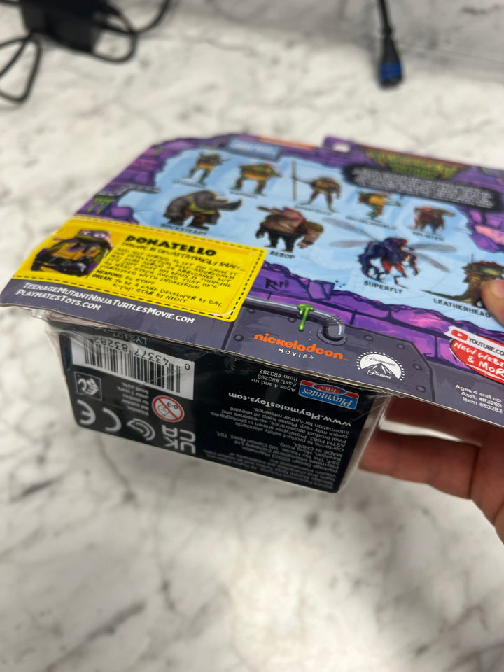 Teenage Mutant Ninja Turtles Mutant Mayhem "DONATELLO" Action Figure New squished box