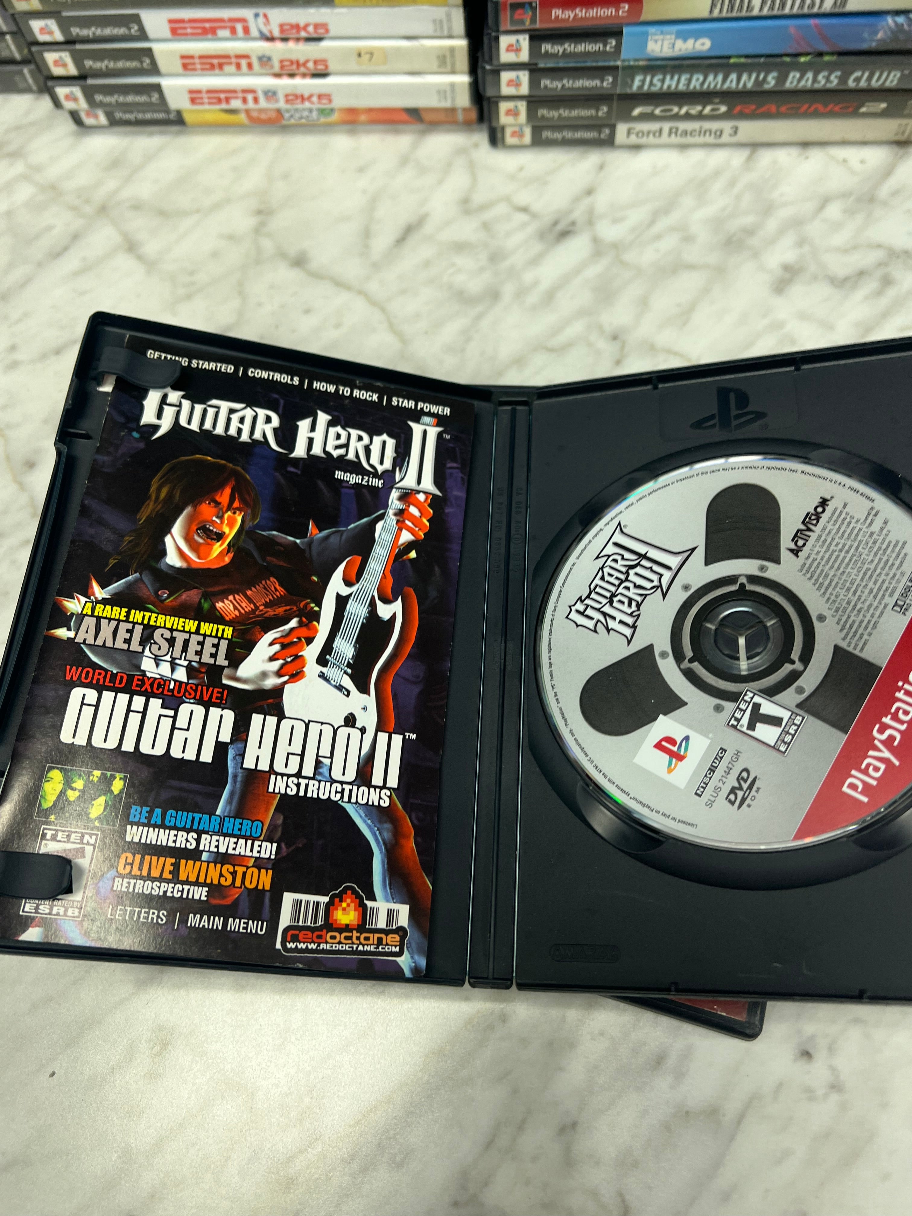 Guitar Hero II - PS2 E1225 – Core Gaming