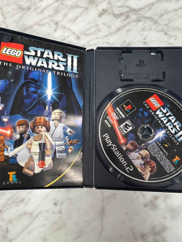 Lego Star Wars II Original Trilogy for Playstation 2 PS2 in case. Tested and Working.     DO63024