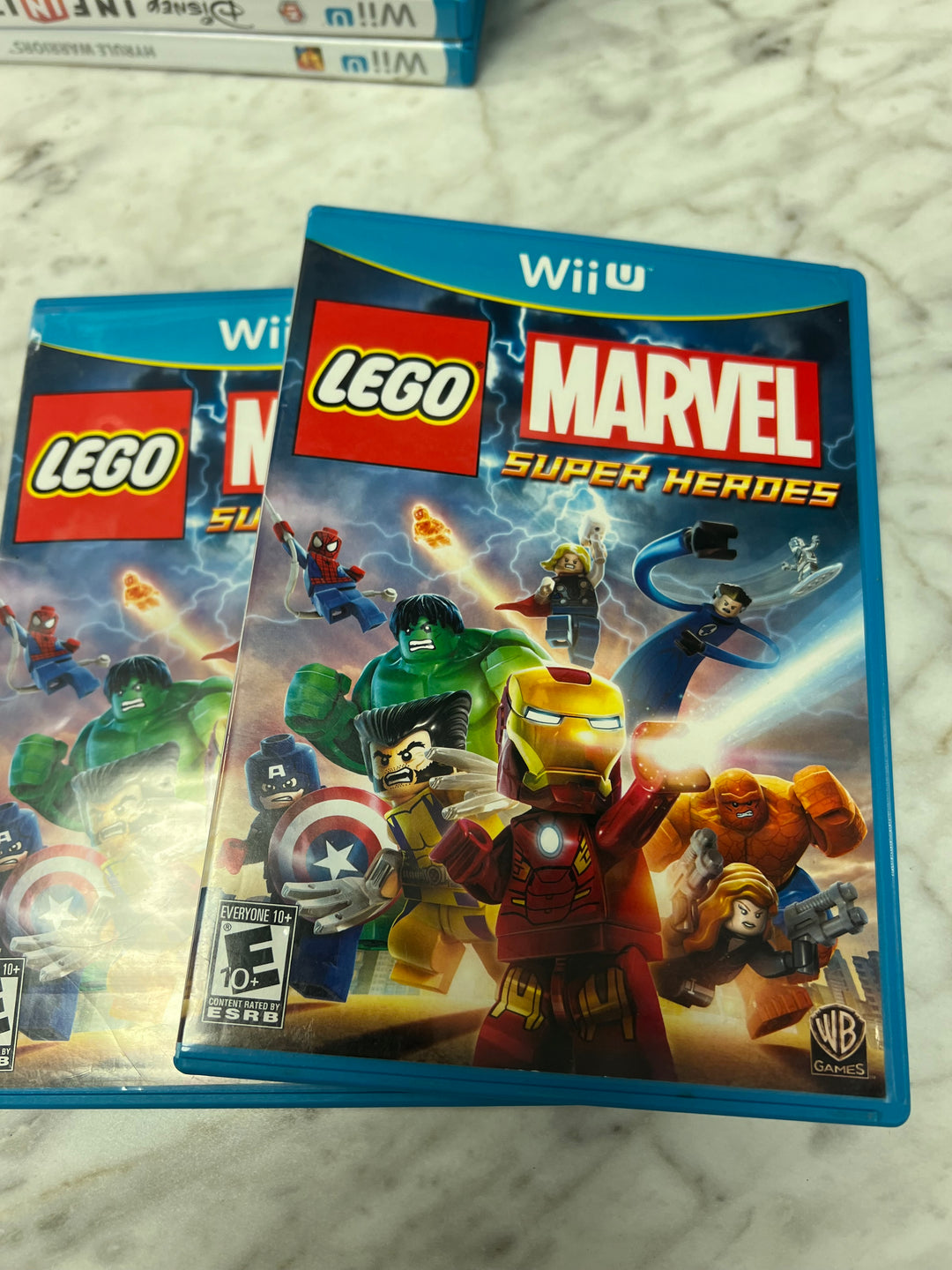 Lego Marvel Superheroes for Nintendo Wii U in case. Tested and Working.     DO61324