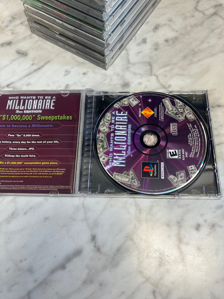 Who Wants to be a Millionaire PS1 Playstation in case. Tested and Working.    DO61224