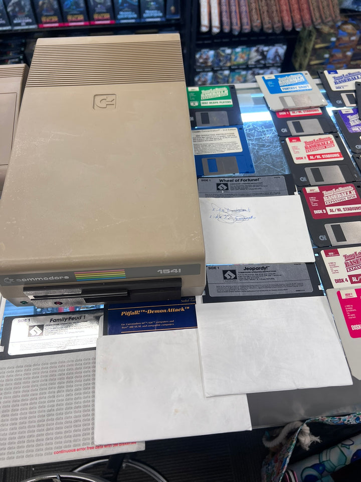 Commodore 64 with 1541 Disk Drive (Untested) and 20 Games Bundle  UA31926
