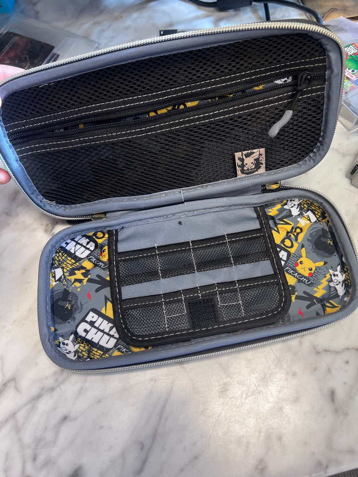 Official Nintendo Switch Soft Carry Case - Pikachu Black/Gold   UA102525