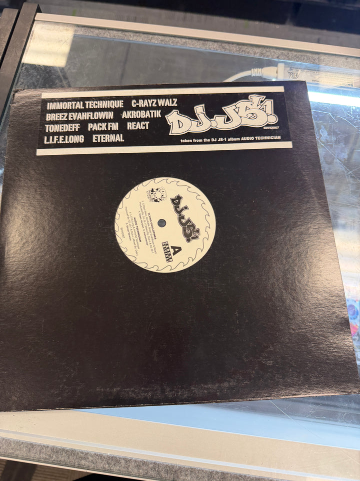 DJ JS-1 - Flying Guillotines / Audio Technician (VG) Vinyl Record VR011926
