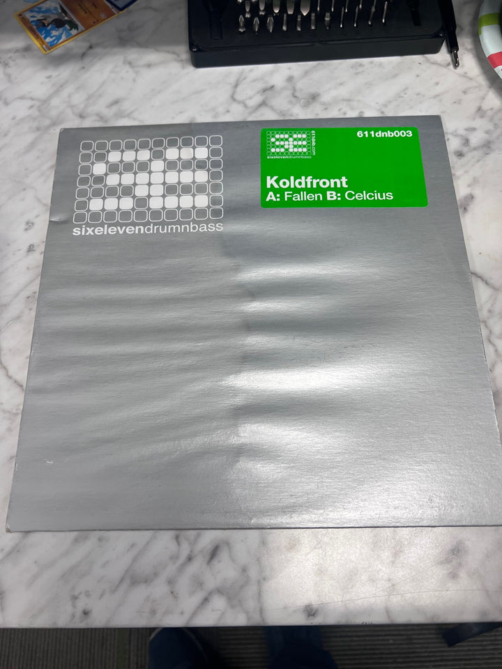 Koldfront sixelevendrumandbass VG+ Condition (water damaged outer) Vinyl Record VR11925