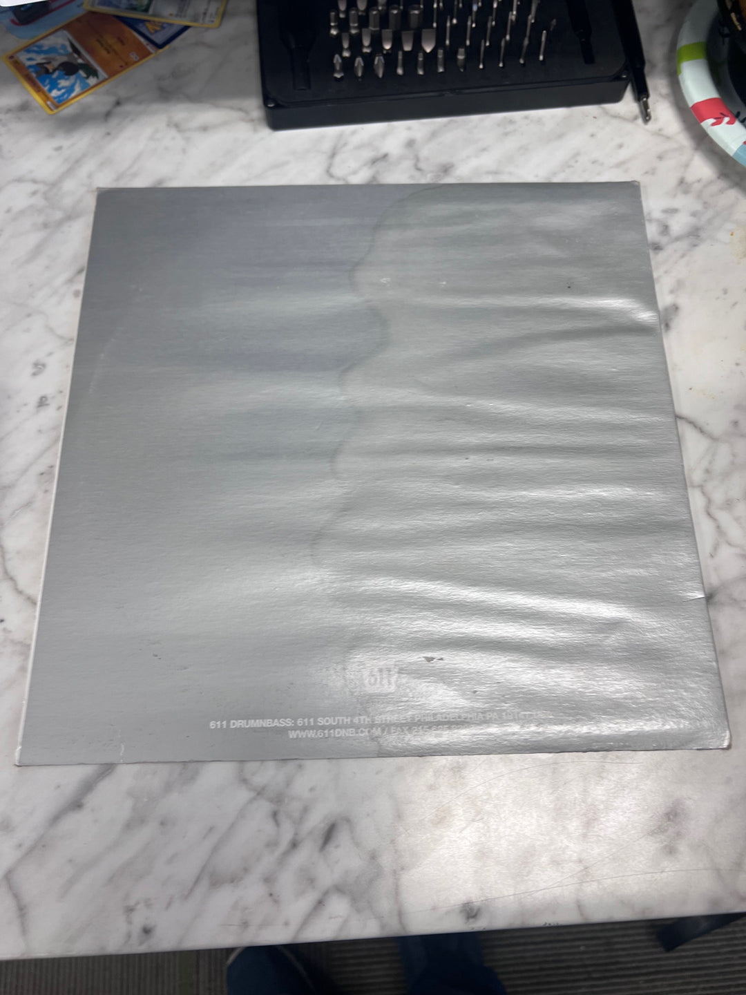 Koldfront sixelevendrumandbass VG+ Condition (water damaged outer) Vinyl Record VR11925