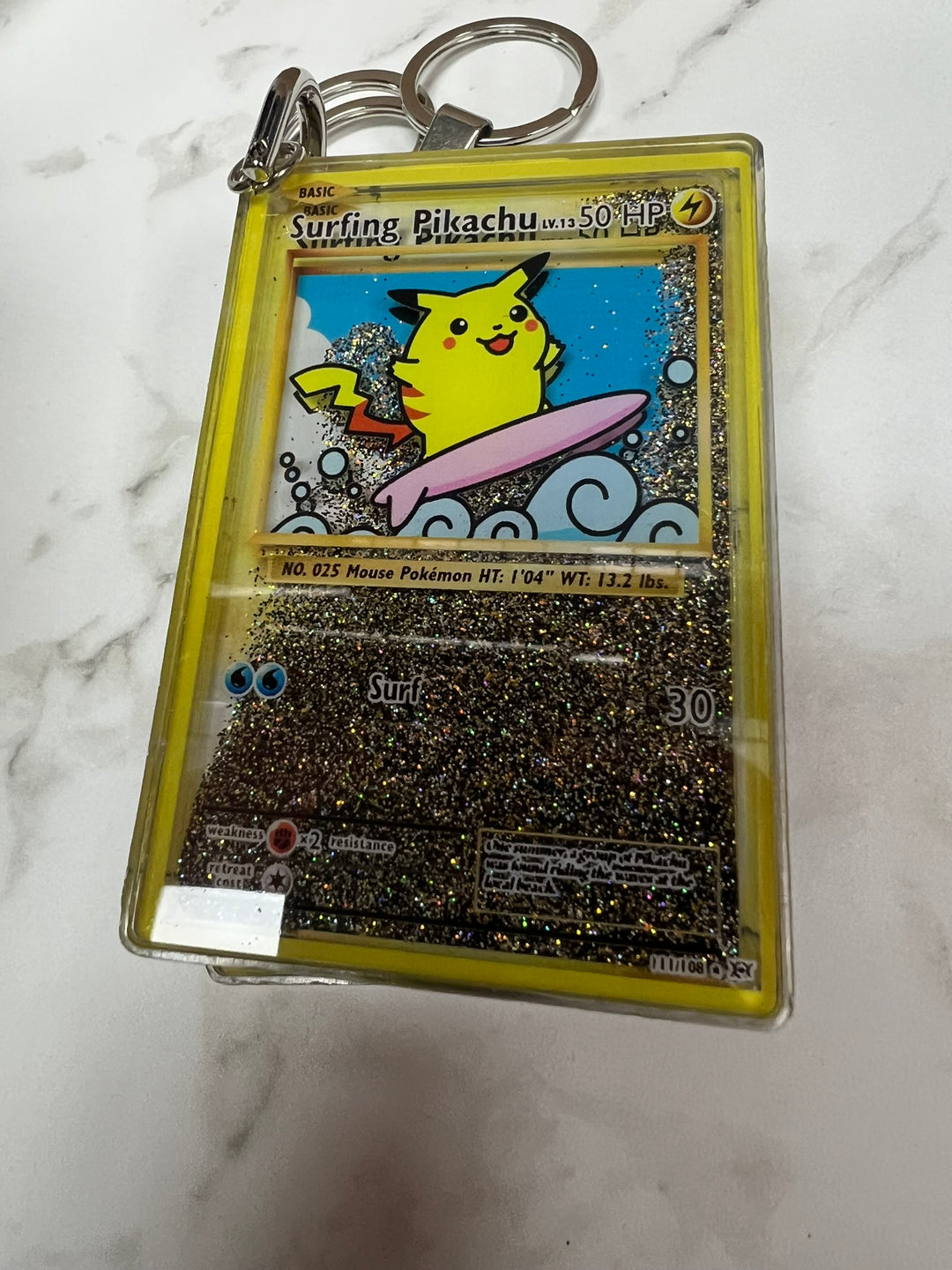 Glitter Filled Keychain (Pokemon Card Style) Surfing Pikachu 111/108 KCM102126