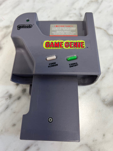 Gameboy Original Game Genie w/ code book