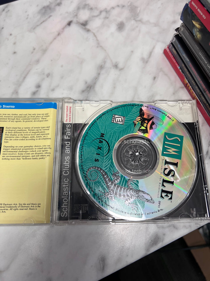 Sim Isle Missions in the Rain Forest (Jewel Case) PC or Mac CD-ROM Used UP111325