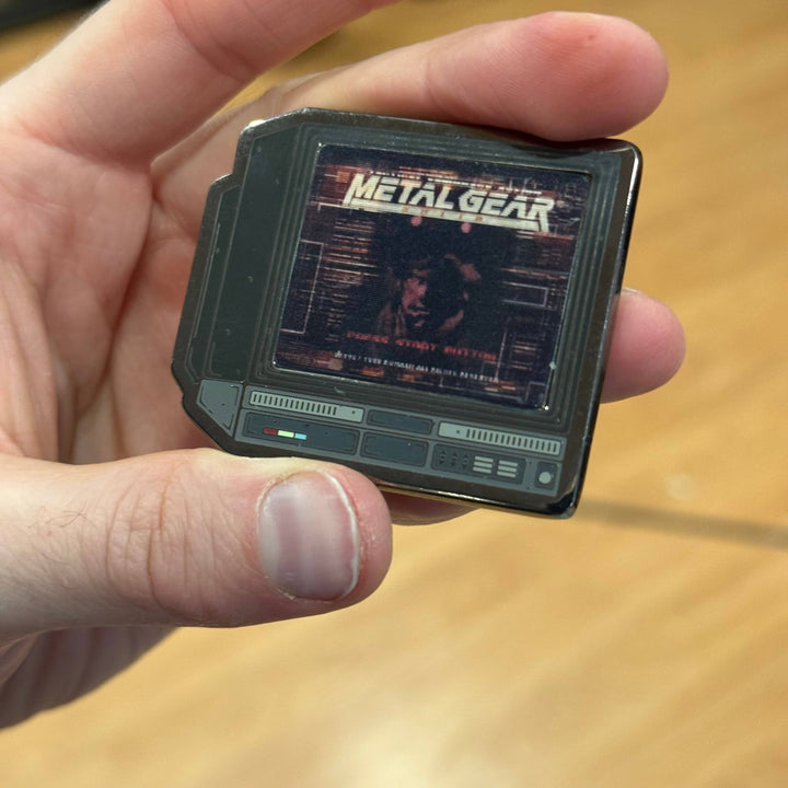2.5" Lenticular Metal Gear CRTV Enamel Pin - NE32726