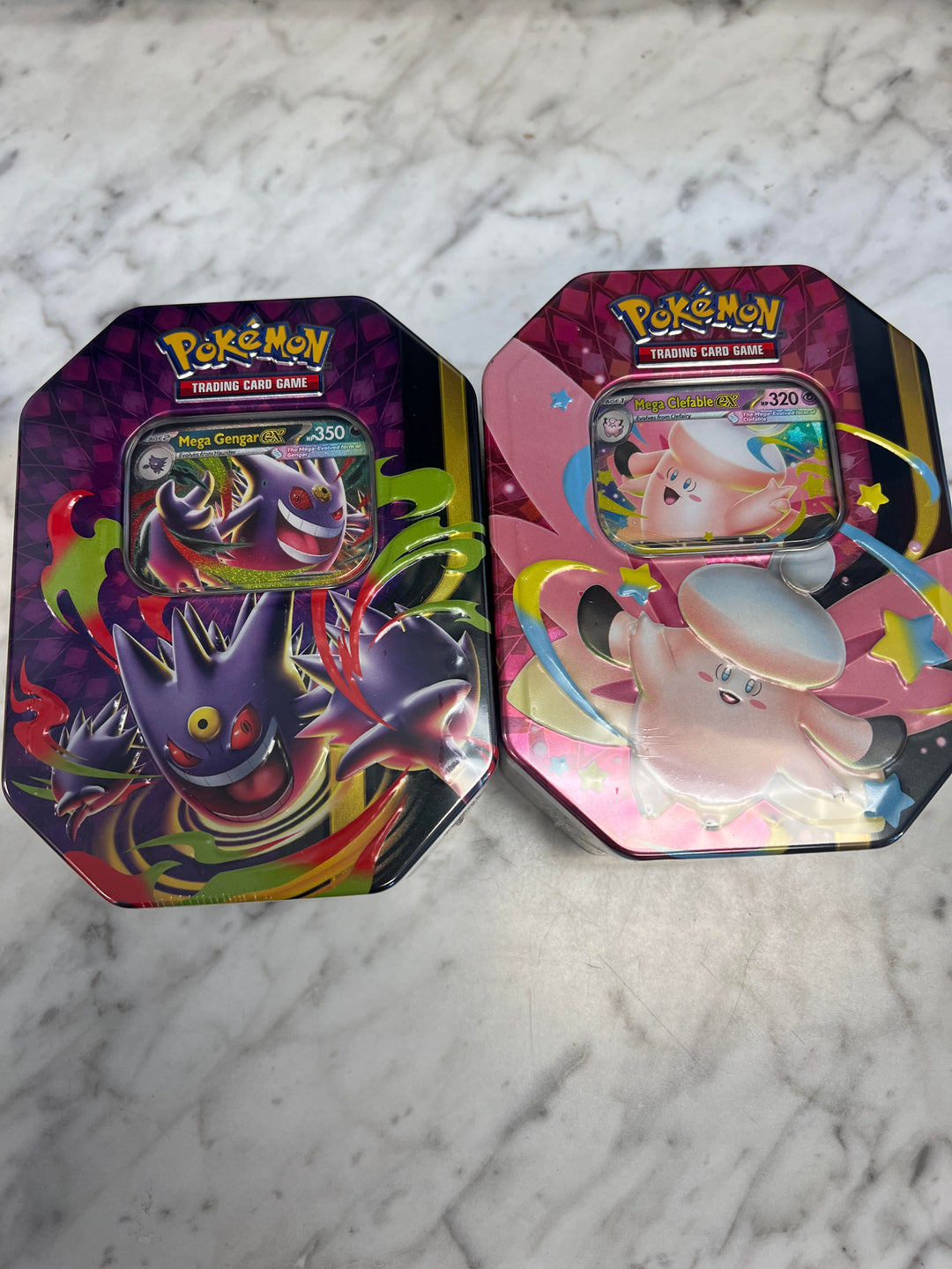 Pokemon TCG Mega Moonlit Tin (Available 6/5/26 IN STORE ONLY)